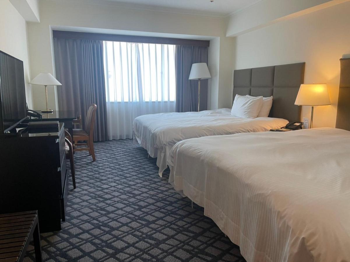 The Howard Plaza Hotel Kaohsiung Eksteriør billede A room at the hotel